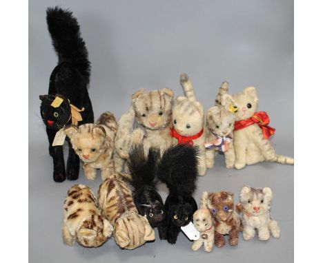 A collection of assorted soft toy cats Condition:- 1950's black plush cat with clear eyes and raised tail - a little worn, he