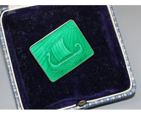 A 20th century Norwegian sterling and green enamel brooch, by Thune, decorated with a Viking ship with sun rays, 30mm, gross 
