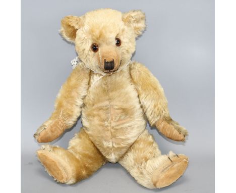 A Chiltern Hugmee c.1930 bear, 18in., blond mohair, hair loss front tummy, repair to right paw, split to left paw