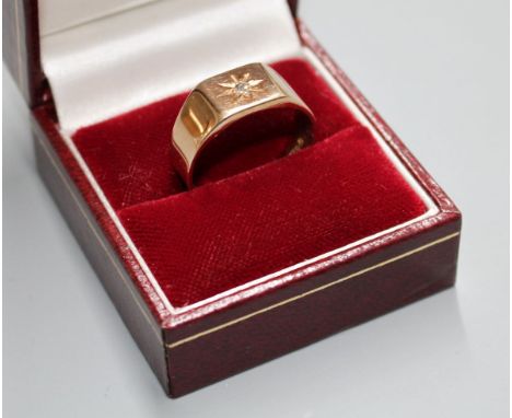 A George V 9ct gold and diamond chip set signet ring, Birmingham, 1929, size R/S, gross 5.3 grams. Condition: Minor surface s