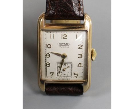 A gentleman's early 1950's 9ct gold Rotary manual wind wrist watch, the rectangular dial with Arabic numerals and subsidiary 