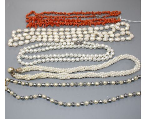 Two coral stick bead necklaces, a freshwater pearl necklace and three other costume necklaces, largest coral necklace 47cm.Co