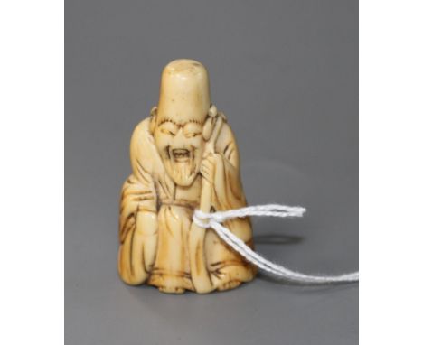 An 18th century Japanese ivory netsuke of Fukurokuju, age splits to the ivory and wear to the details of his face, 5cm