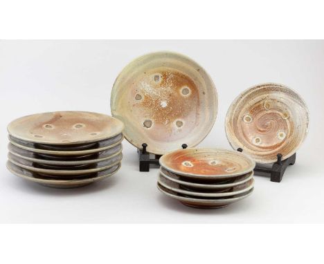 † PHIL ROGERS (1951-2020); a set of six salt glazed side plates with impressed shell decoration, impressed PR marks, diameter