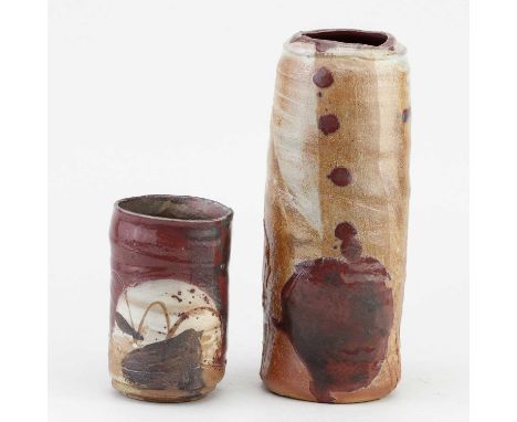 † ADAM FREW (born 1981); a cylindrical stoneware vase covered in oatmeal glaze with copper red and incised decoration, impres