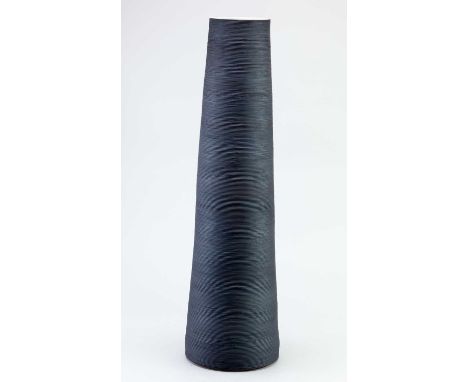 † DANIEL SMITH; a tall tapered porcelain vase covered in bronze glaze, incised DS mark, height 48.5cm.Condition Report: Appea