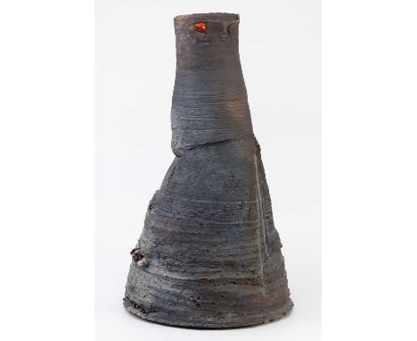 A large tapered stoneware vessel with split rim decorated with coloured slips, glazes, lustres and enamel, height 46cm.Proven