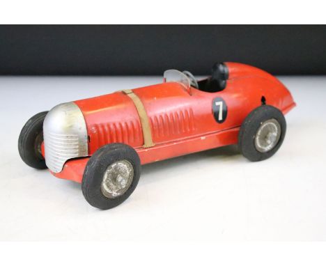 Tinplate Prestyn of England single seat number 7 racing car, comprising of red body with black seat, bonnet strap, windscreen