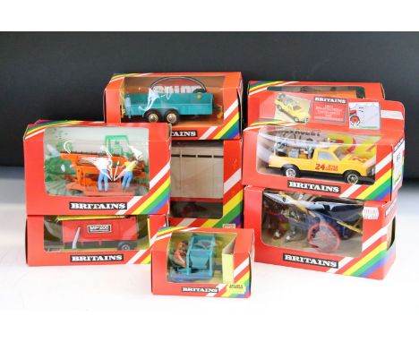 Nine boxed Britains farming models to include 9580 Animal Transporter, 9573 Chevy Farm Service Vehicle, 9499 Tumbrel Cart, 95