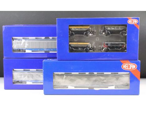 Four boxed Heljan OO gauge items of rolling stock to include 5010 Cargowagen basic blue &amp; silver weathered, 5004 Cargowag