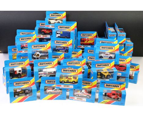 82 Boxed Matchbox diecast models in blue boxes with 'red/yellow stripe', all appearing unopened 