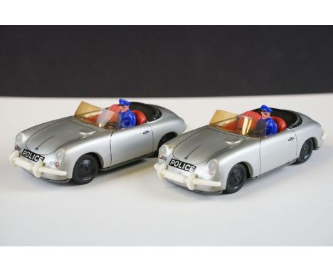 Two Tipp &amp; Co West German tinplate Porsche Police car models, in silver, with windscreens &amp; drivers. (One missing whe