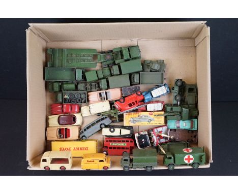 Over 30 mid 20th C play worn diecast models to include mainly Dinky examples, featuring Dinky 131 Cadillac Eldorado, Dinky 13