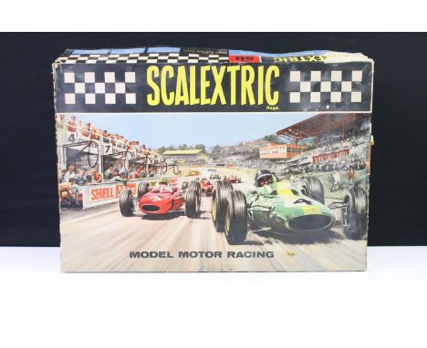 Boxed Triang Scalextric Set 50, appearing complete with 2 x slot cars featuring C81 Cooper in white and C82 Lotus in blue, co