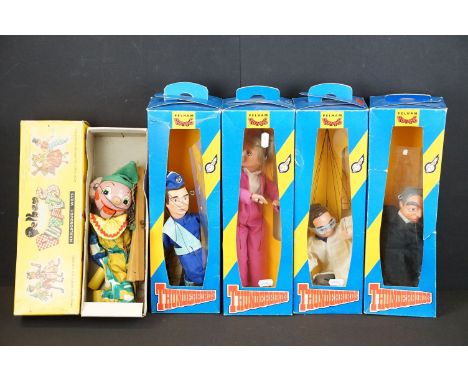 Four boxed Pelham Puppets Thunderbirds puppets to include Lady Penelope, Brains, Parker (box shows tearing &amp; displaced wi