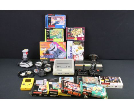 Retro Gaming - SNES Super Nintendo Entertainment System games console with 9 boxed game cartridges (Sim City, Super Tennis, F
