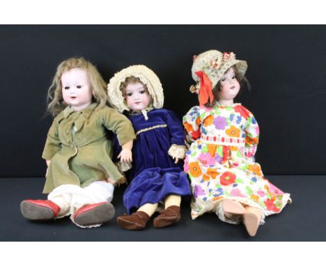 Three early 20th C Armand Marseille bisque headed dolls with glass sleeping eyes, open mouths, painted facial features &amp; 