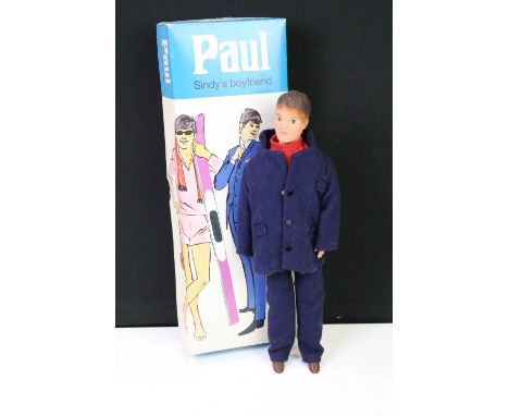 Pedigree Sindy - A boxed Sindy's Boyfriend Paul fashion doll, no. R1131, clothed in navy blue button-up coat over a red sweat