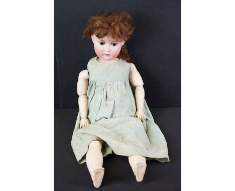 Early 20th C William Goebel German bisque headed doll, clothed, with sleeping glass eyes, mouth open showing teeth &amp; join