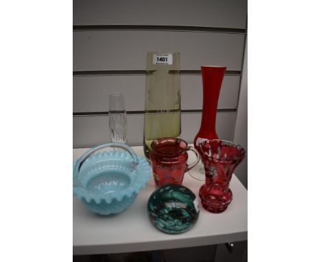 A selection of vintage art glass, including cranberry glass jug with enamel detail, vaseline glass posy basket and etched vas