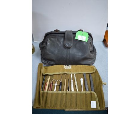 1930's Leather Gladstone Bag plus Mirror and a Roll of Surgical Tools etc. 