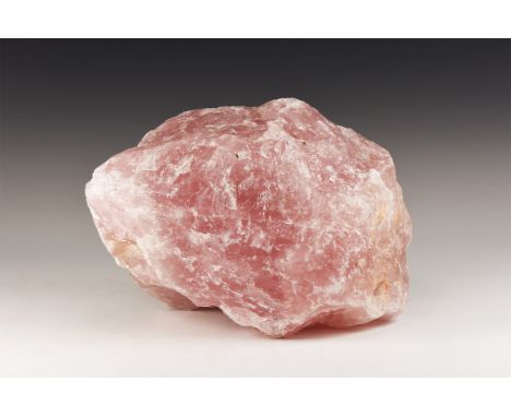 A large boulder of rose quartz showing good colour with flat base for display.   4.70 kg, 16cm tall (6 1/4"). From the former