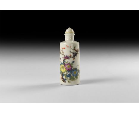 An undated archaistic white glazed ceramic snuff bottle with branch, blossom and bird, leaf motif to the underside.   49 gram