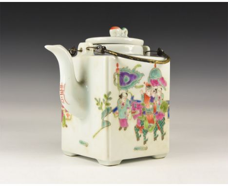 20th century AD. A white glazed ceramic rectangular teapot with short spout, frieze depicting a New Year (Ch?n Jié) dragon pr