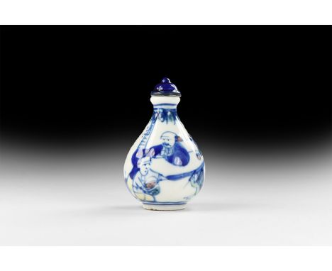 20th century AD. A glazed ceramic snuff bottle, bulbous with sloping shoulders and domed lid, figural design with flowers.   