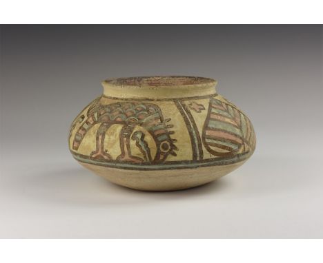 Indus Valley Mehrgarh Polychrome Bowl with Bird and Lion. 3rd millennium BC. A large ceramic Nal culture storage jar with pol