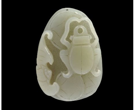 19th century AD or later. A carved ovoid plaque depicting a beetle on a bed of discs; pierced above for suspension.   21 gram