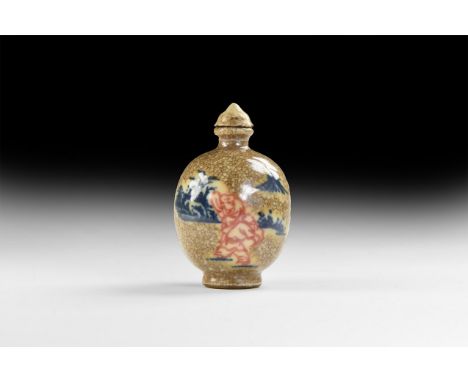 20th century AD. A glazed ceramic snuff bottle with domed lid, figural design with forest.   69 grams, 76mm (3"). Acquired on
