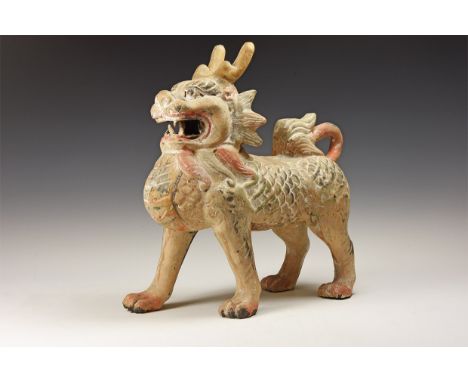 20th century AD. A hollow-formed ceramic dragon in advancing pose with mouth open, painted scales and other detailing.   2.4 