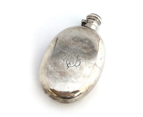 A silver spirit or hip flask, London 1933, makers WS, the front monogrammed HSE, 181g (6.38 oz), 12cm