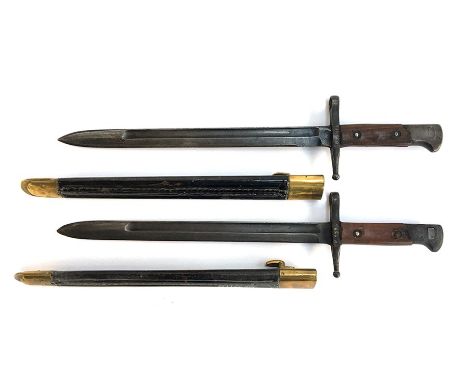 Two Italian M1891 second world war bayonets, stamped to ricasso 'TERNI', with leather scabbards with brass fittings, both wit