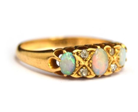 An 18ct gold, opal and diamond ring, gr.wt.3.26g , size P