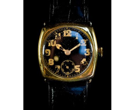 A FINE GENTLEMAN’S 18CT CUSHION SHAPED WATCHCIRCA 1919, WITH BLACK CERAMIC DIALINSCRIBED TO ARTHUR V. KEWNEY. FROM THE COMMIT