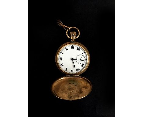 A gold plated pocket watch, the case marked Elgin, Illinois, on a 9ct gold chain (net weight 32g) with a George V 1911 sovere