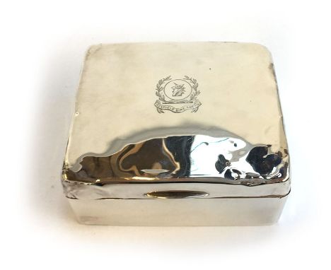 A silver trinket box lined in sandalwood, having the Dendy family crest, a unicorn's head, and bearing the motto 'Respicio Si