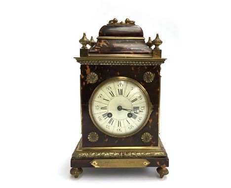 A 19th century French tortoise shell mantle clock, movement by F Marti, Paris, the 10.5cm white enamel dial with Arabic numer