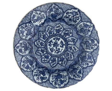 Chinese blue and white charger, Kangxi (1662-1722), with lobed rim, decorated with radiating lotus-shaped panels containing s