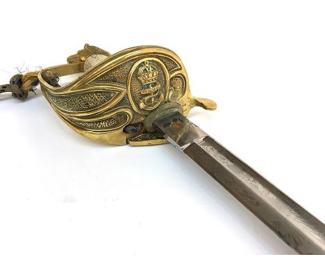 A George VI Royal Navy officer's dress sword, the folding guard incorporating crowned anchor, lion's head pommel, sharkskin g