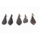 Five leather shot flasks some with embossed decoration, with brass measuring spouts Generally good