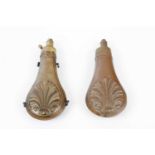 Two copper and brass powder flasks with embossed shell decoration, one by G & J W Hawksley with four