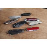 Eight various penknives inc. Victorinox Camping