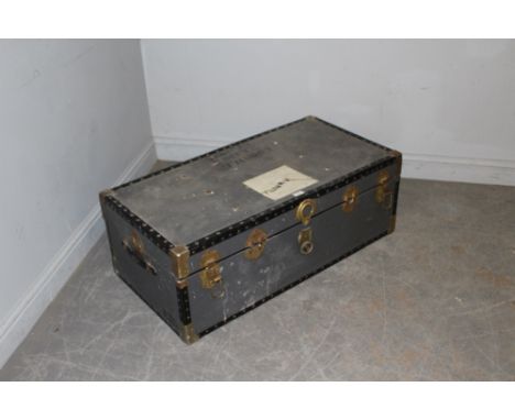 A large blue leather canvas travel trunk, with blue checked material lining 35cm x 100cm x 51cm used but generally good, name