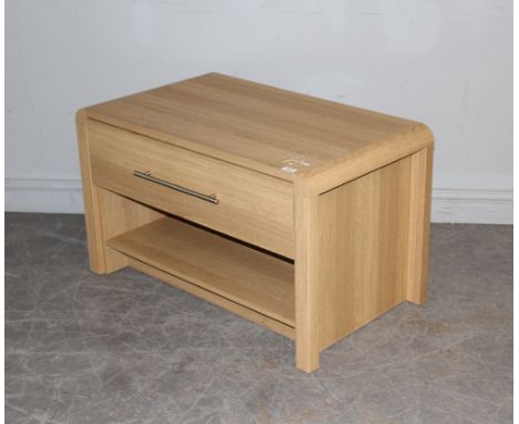 A modern light oak effect television stand, with single drawer 54cm x 88cm x 52cm some ring stains and damage to the laminate