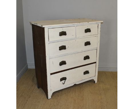 A late Victorian white-painted oak chest of drawers, two short and three long drawers each with embossed brass back-plates an