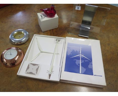 Georg Jensen - a quartz clock and a thermometer, 14cm and 13cm diameter, a littala little Red Turn glass bird, a Vestas turbi
