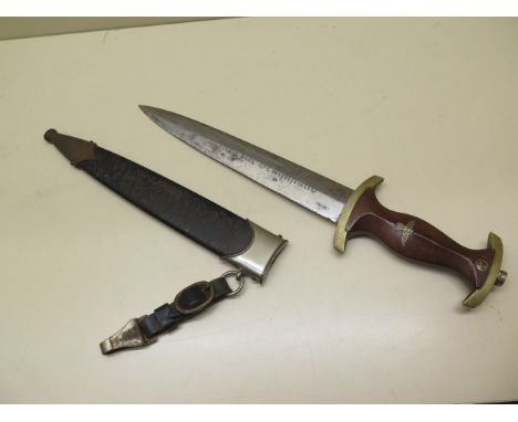 A German dress dagger, the blade marked 'Alles Fur Deutschland' RZM M7/34, blade 22cm long, with scabbard, pitting to scabbar